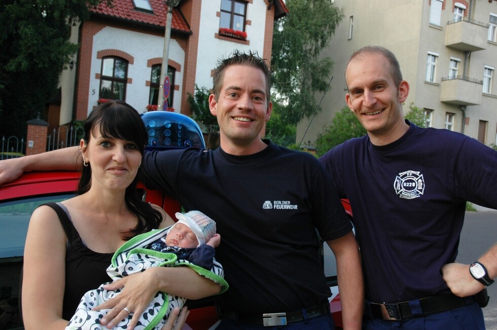 Familie mit Feuerwehrleuten
