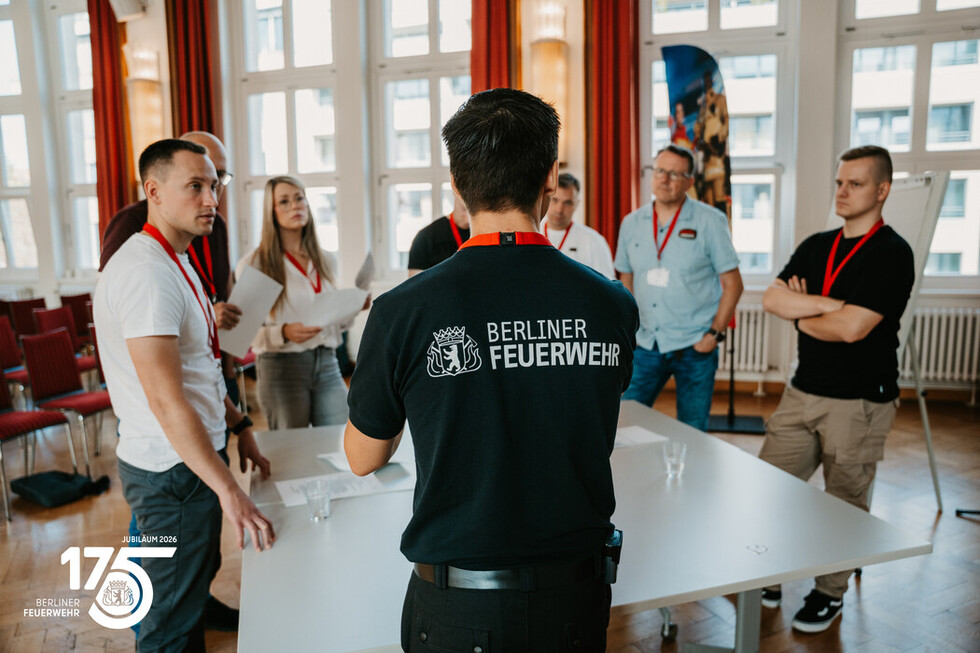 Die Teilnehmenden tauschen sich im Rahmen eines Workshops aus.